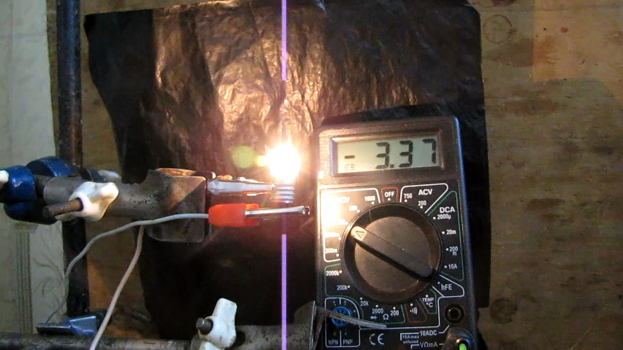    3.5       220 . 3.5-volt incandescent lamp was plugged into mains with voltage of 220 V (AC)