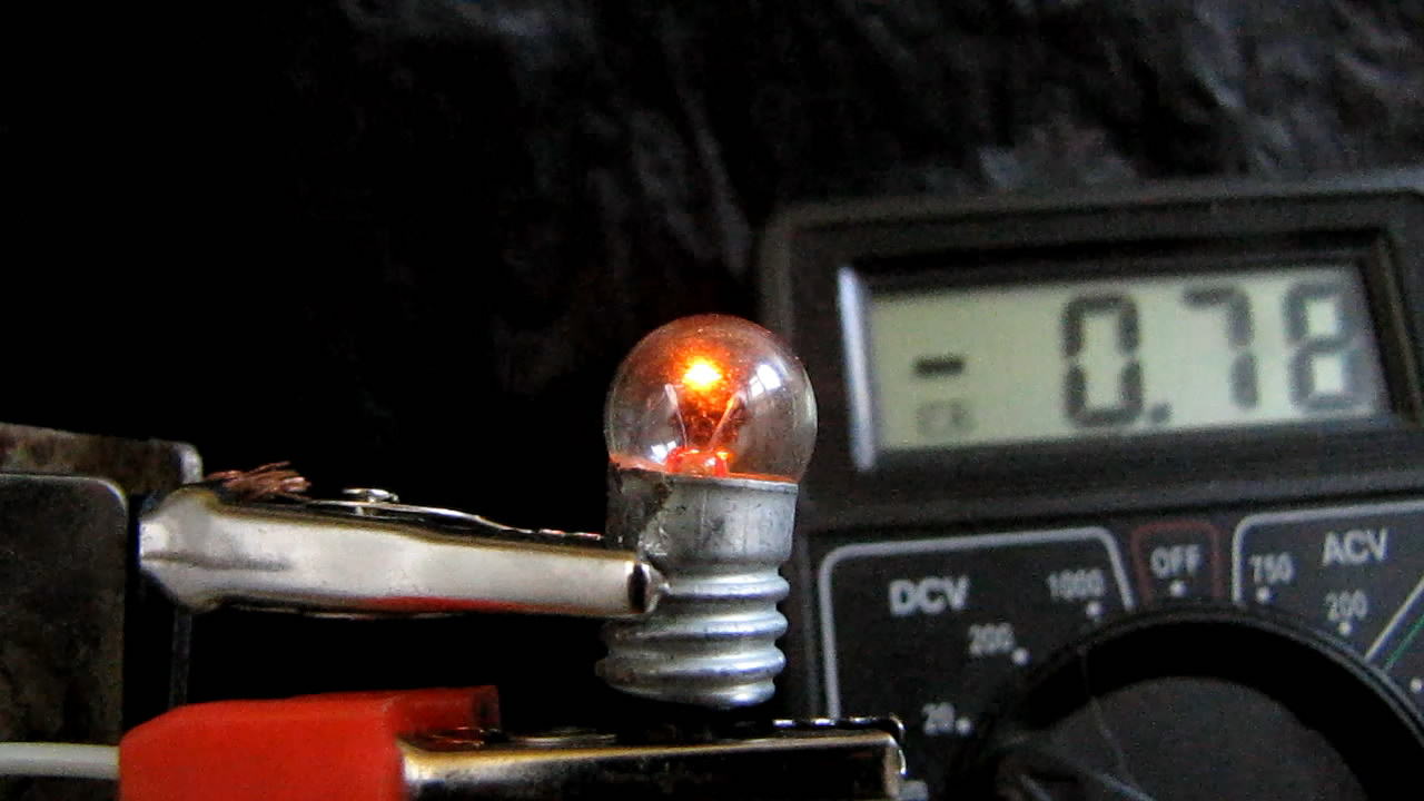    3.5       220 . 3.5-volt incandescent lamp was plugged into mains with voltage of 220 V (AC)