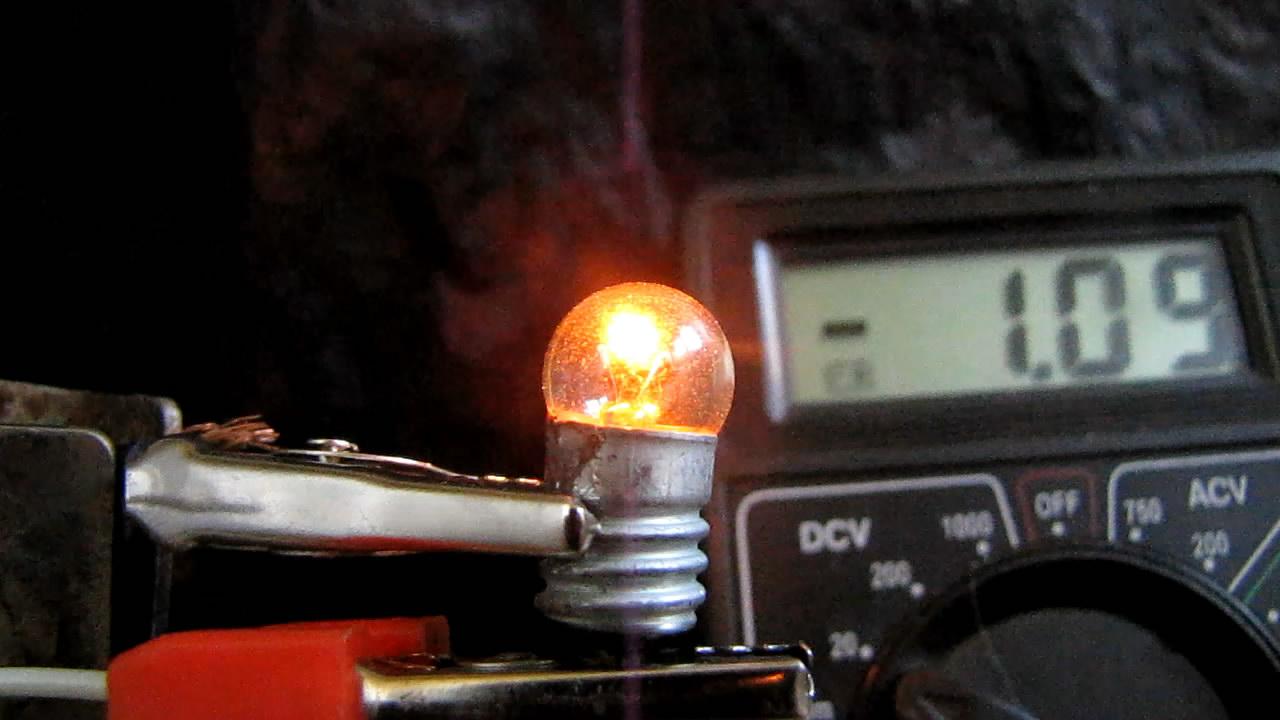    3.5       220 . 3.5-volt incandescent lamp was plugged into mains with voltage of 220 V (AC)