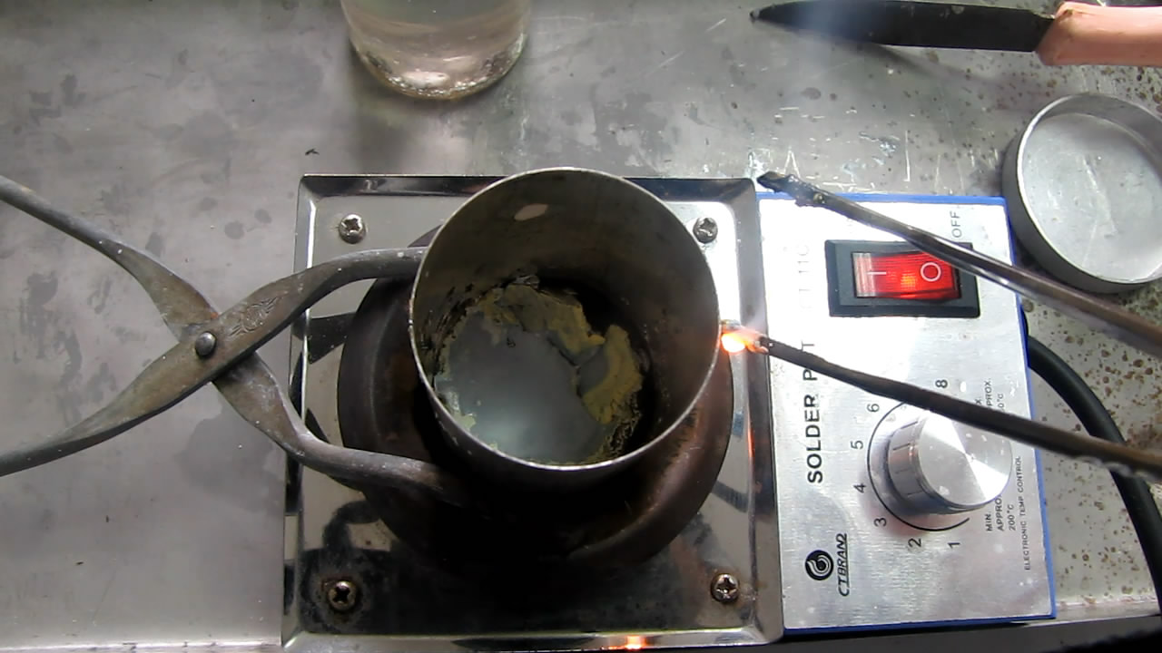   ( ). Melting of sodium (in crucible)