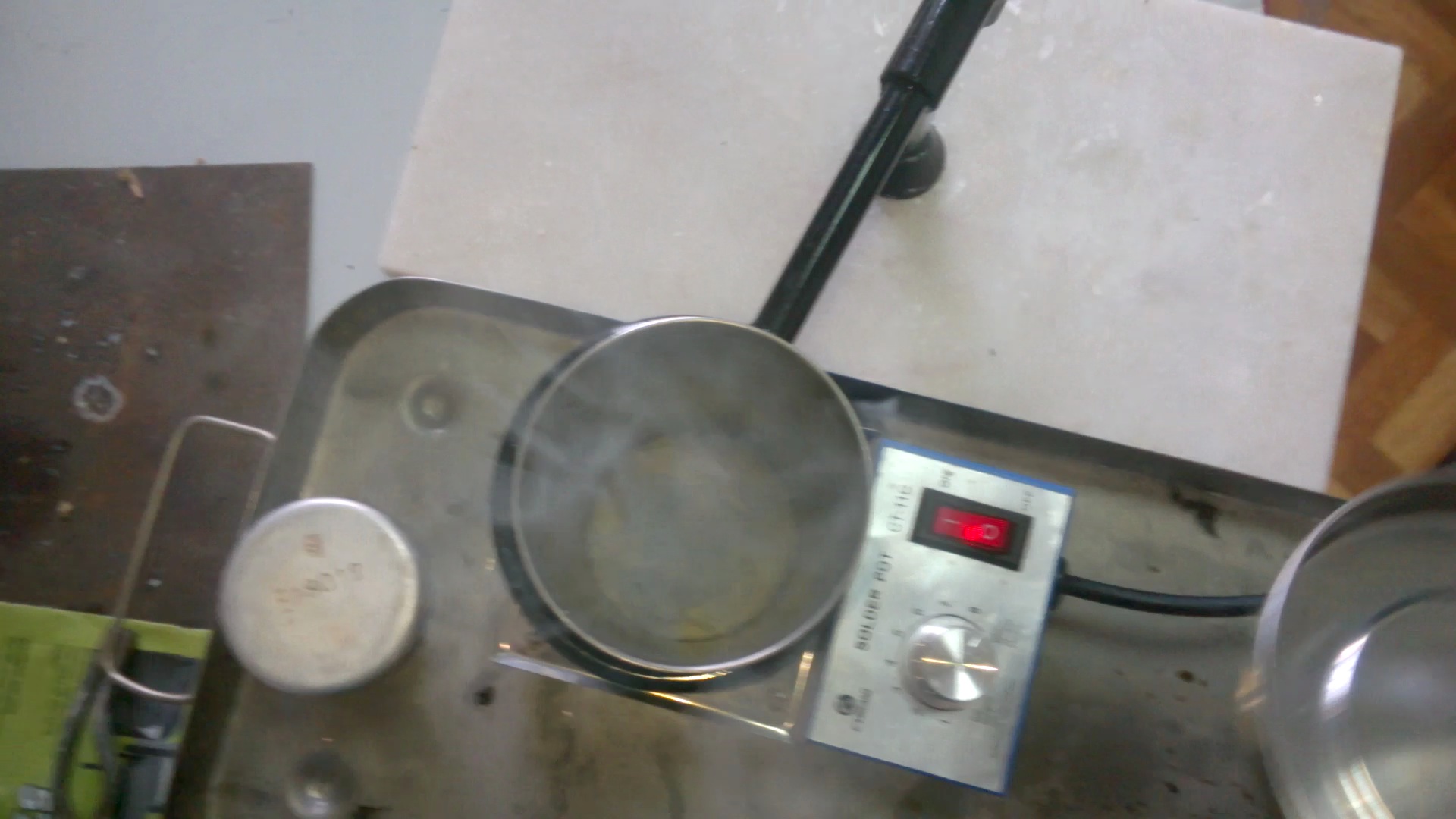   ( ). Melting of sodium (in crucible)