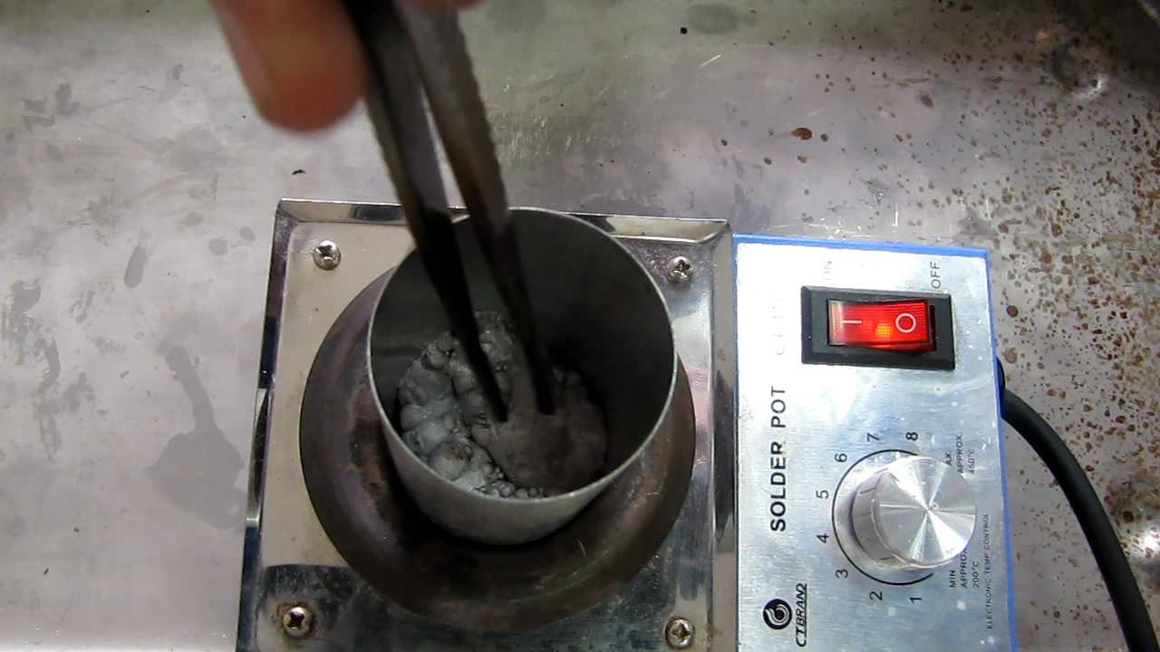   ( ). Melting of sodium (in crucible)