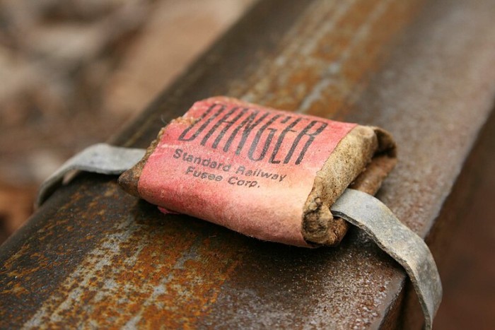 Railroad_torpedo_with_lead_straps.jpg